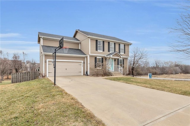 view of front of property featuring a garage and a front yard