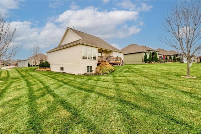 exterior space featuring a yard and a deck