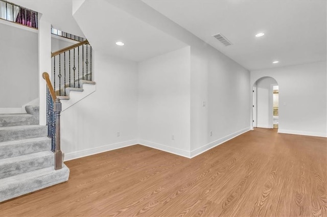 unfurnished living room featuring light hardwood / wood-style flooring