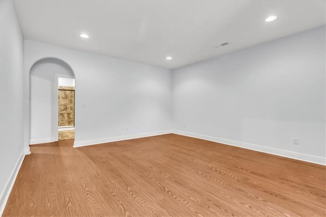 empty room with light wood-type flooring