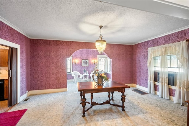 office area with ornamental molding, arched walkways, a textured ceiling, and wallpapered walls