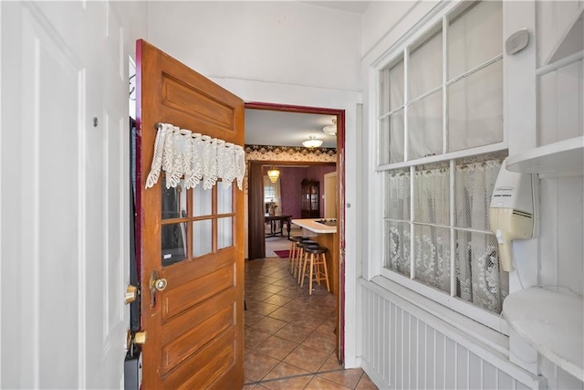 interior space featuring light tile patterned floors