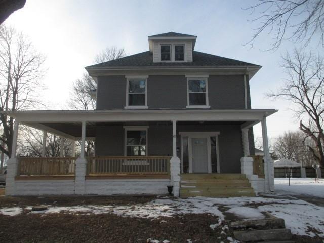 view of front of house featuring covered porch