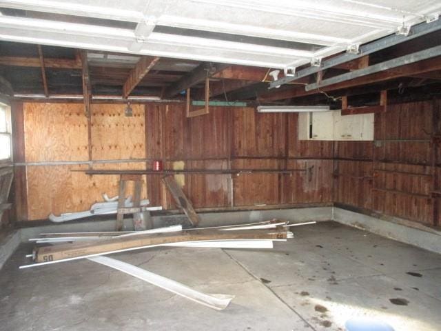 garage with wood walls