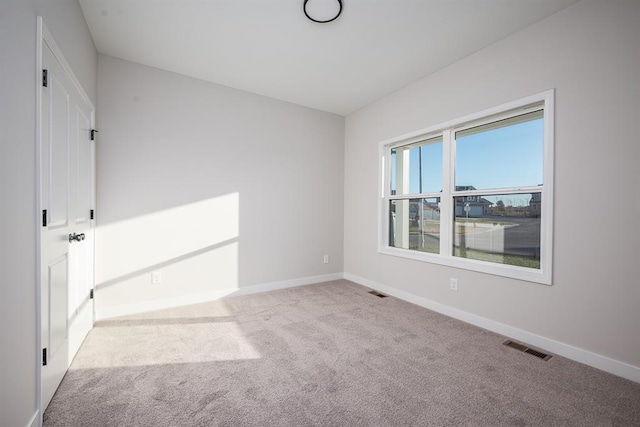 view of carpeted spare room