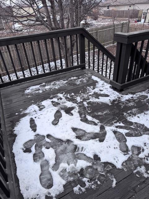 view of snow covered deck