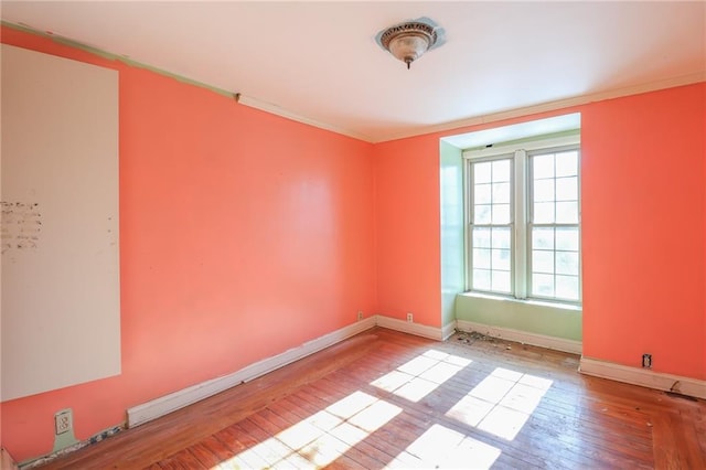 spare room with light hardwood / wood-style flooring