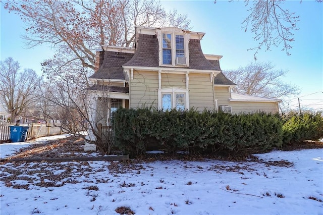 view of snow covered property