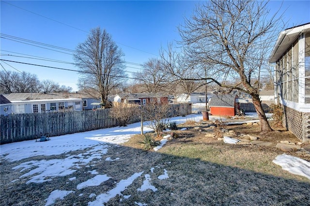 view of yard covered in snow