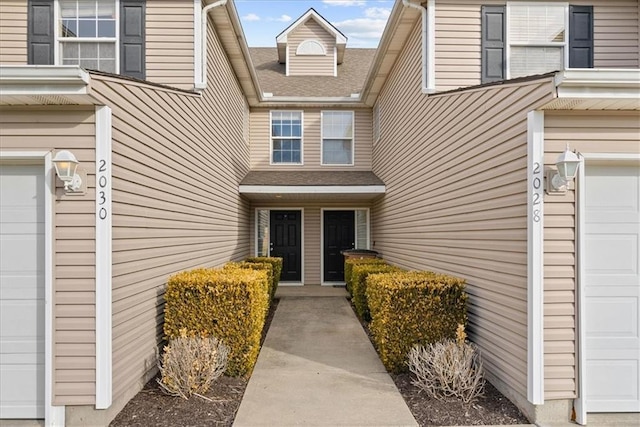 property entrance featuring a garage