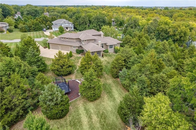 aerial view with a wooded view