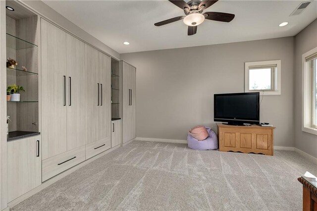 interior space featuring baseboards, recessed lighting, visible vents, and light colored carpet