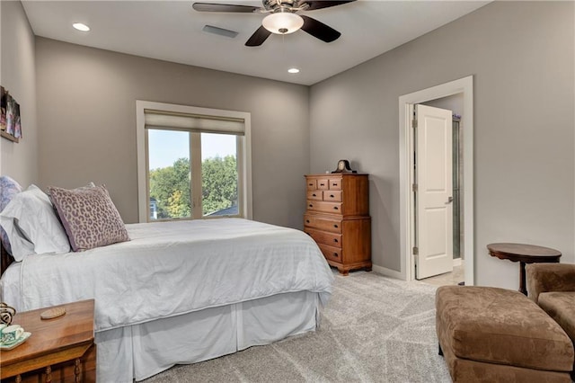 bedroom featuring light carpet, baseboards, a ceiling fan, and recessed lighting