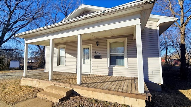 entrance to property with a porch