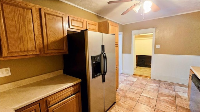 kitchen with ceiling fan, appliances with stainless steel finishes, and ornamental molding