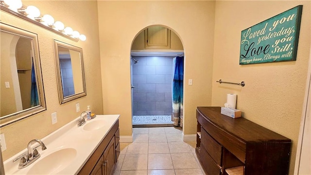 bathroom with vanity, tile patterned floors, and a shower with shower curtain