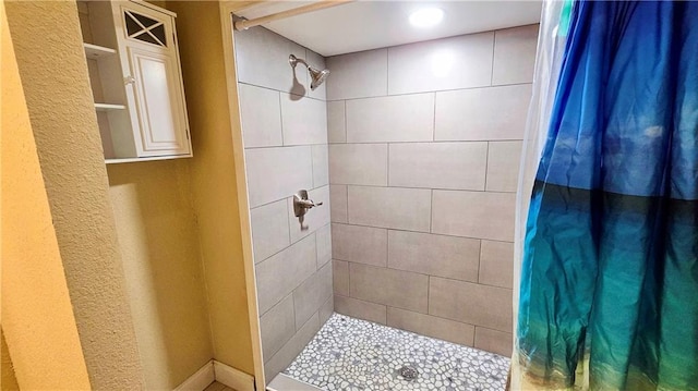 bathroom featuring walk in shower