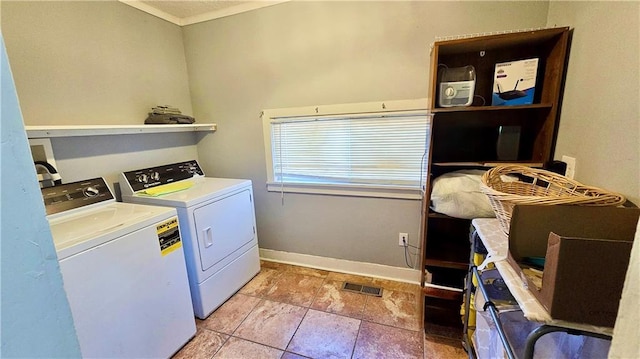 laundry room featuring washer and clothes dryer