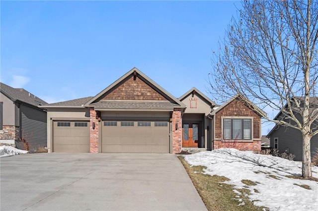 craftsman-style home with a garage