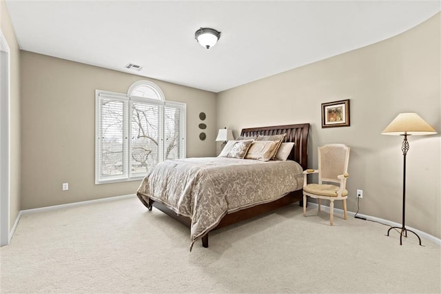 bedroom featuring carpet, baseboards, and visible vents