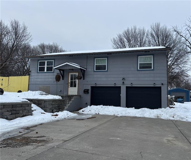 split foyer home featuring a garage