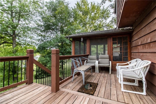 deck featuring a sunroom