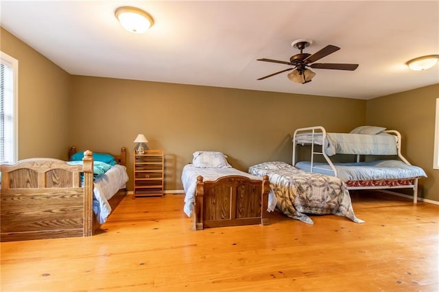 bedroom with hardwood / wood-style flooring