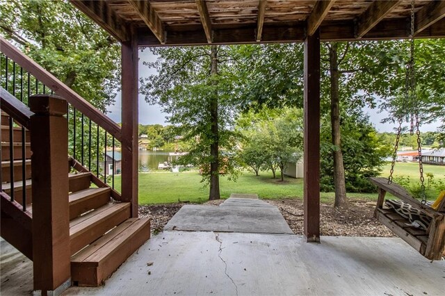 view of patio / terrace featuring a water view