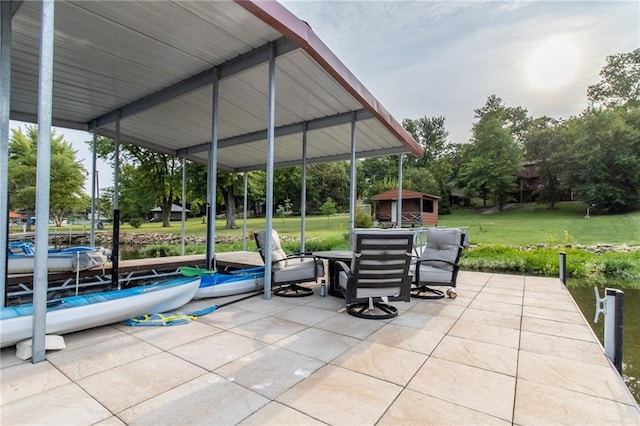 view of patio with a shed