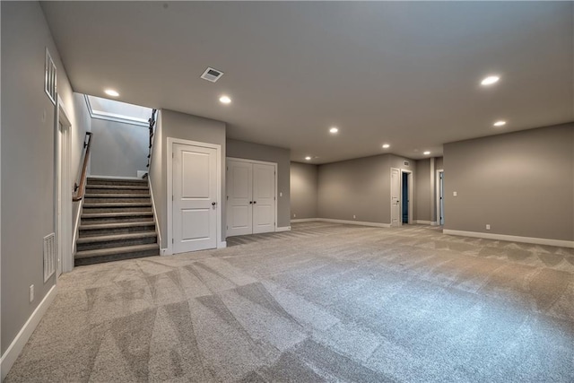 basement with light carpet