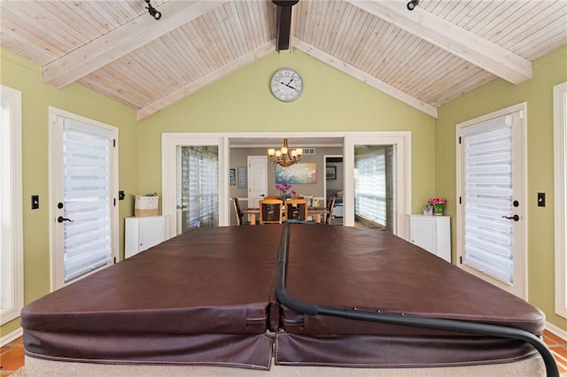 dining room with wooden ceiling, a notable chandelier, and lofted ceiling with beams