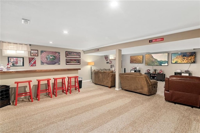 living room featuring carpet floors, recessed lighting, visible vents, and baseboards