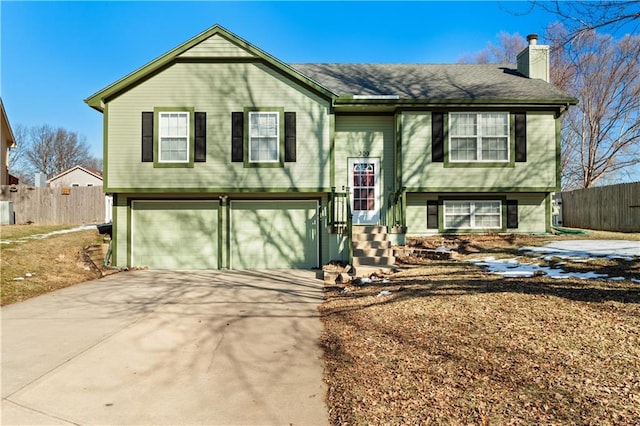 raised ranch with a garage