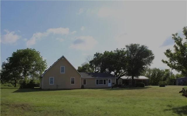 exterior space featuring a front lawn