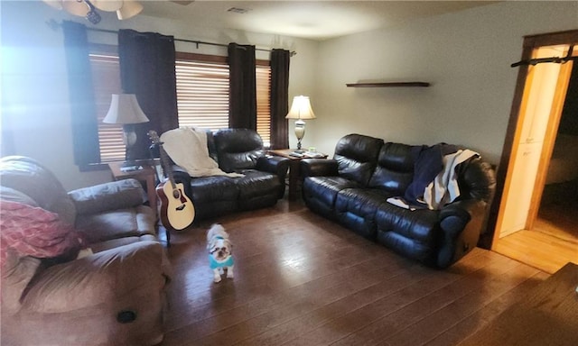 living room with dark wood-type flooring