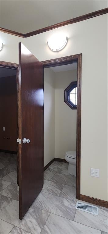 bathroom featuring toilet