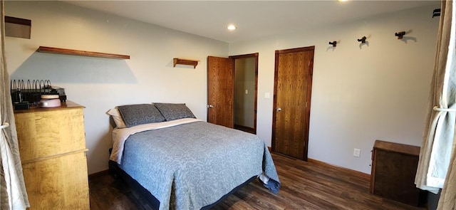 bedroom featuring dark hardwood / wood-style floors