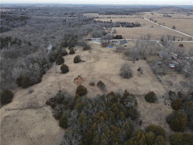 birds eye view of property featuring a rural view