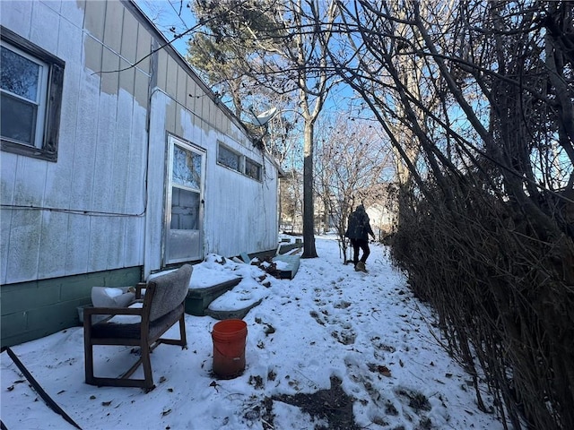 view of yard covered in snow