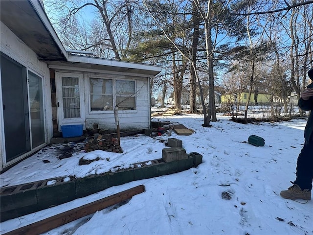 view of yard layered in snow