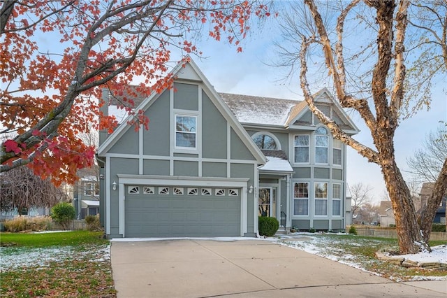 tudor house with a garage