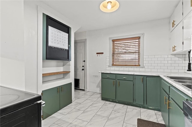 kitchen featuring green cabinetry, white cabinets, black / electric stove, decorative backsplash, and stainless steel dishwasher