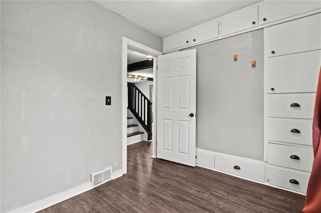 interior space featuring dark wood-type flooring