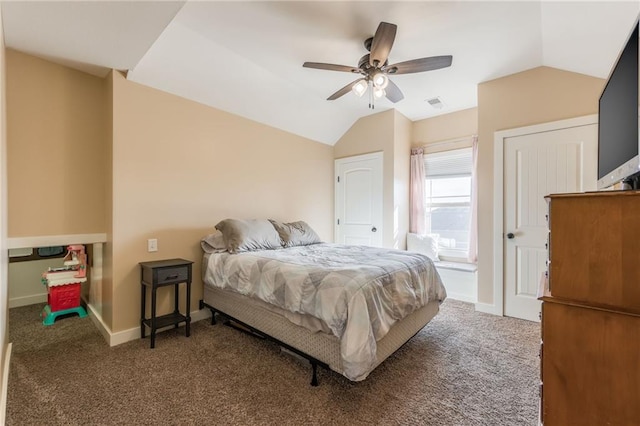 bedroom featuring vaulted ceiling, carpet flooring, and ceiling fan