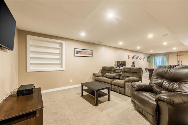 cinema room with built in features and light carpet