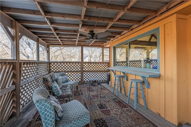 wooden deck featuring an outdoor hangout area, a patio, and outdoor dry bar