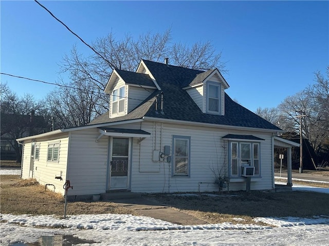 view of front of property featuring cooling unit