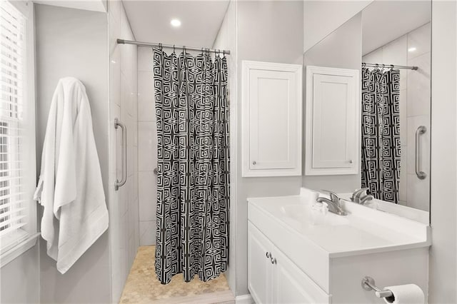 bathroom featuring vanity and a shower with curtain