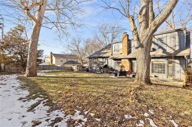 view of yard covered in snow