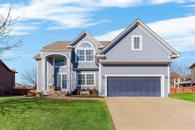 front facade with a front lawn and a garage